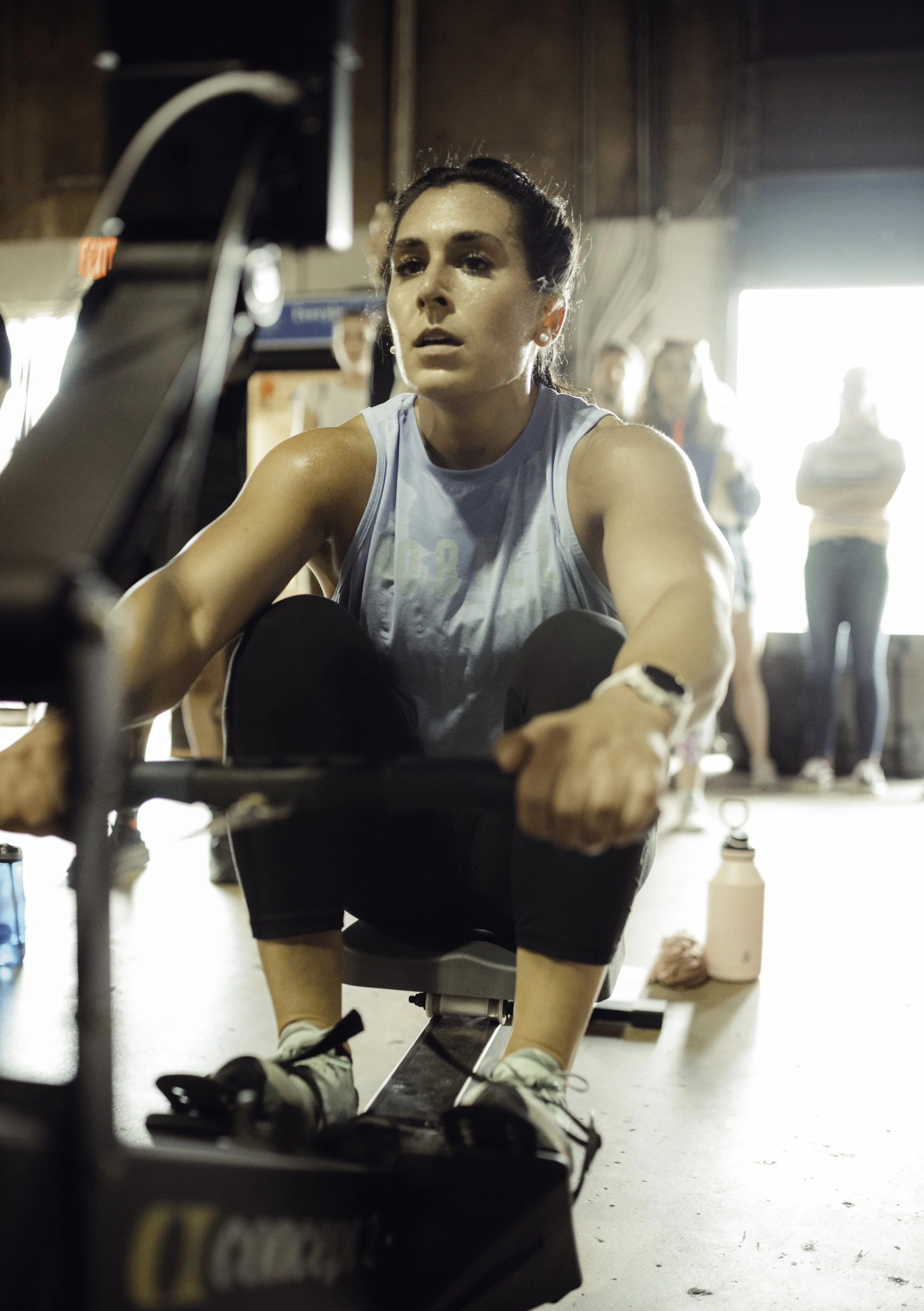 Athlete preparing for a lift inside the Deep River Fit gym.